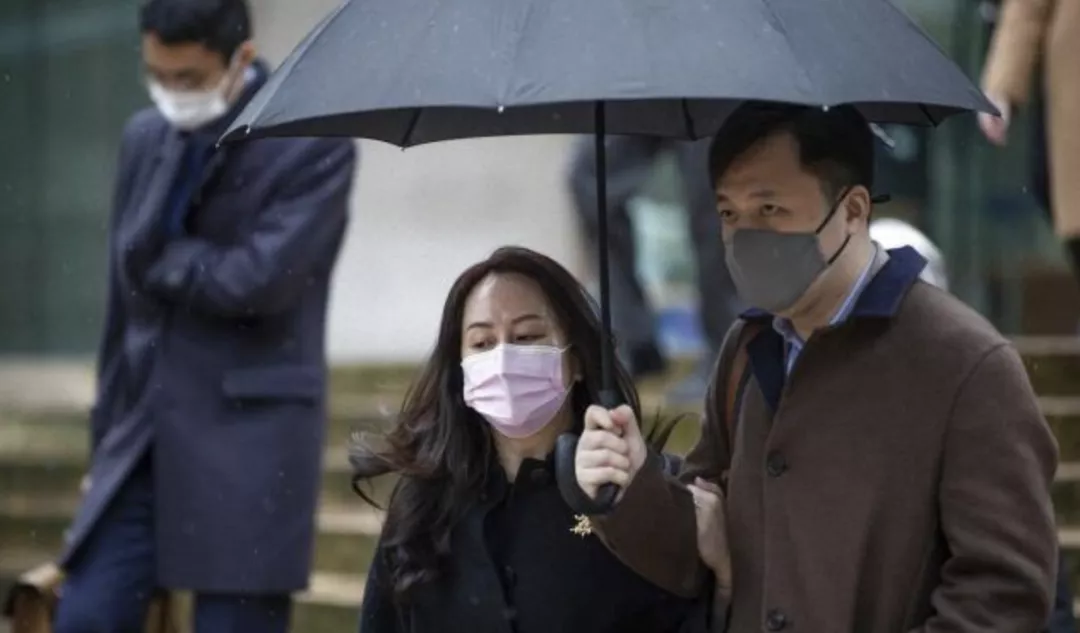 孟晚舟回國24小時后，她背后的男人火了